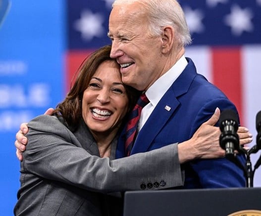 Vice President Harris warmly embracing President Biden.