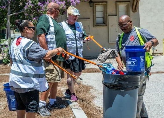 From left Jessica Lopez, Jason Owens, Michelle Heinemann and Josh Hunter are homeless but working together in the Homeless to Work Program as they cleanup a parking lot in Banning on Friday, July 19, 2024. (Photo by Terry Pierson, The Press-Enterprise/SCNG)