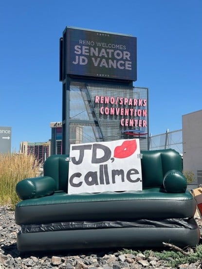 ance
Ltl
RENO WELCOMES
SENATOR
A picture of a couch with a “JD CALL ME and a picture of lips  “ sign  

callme