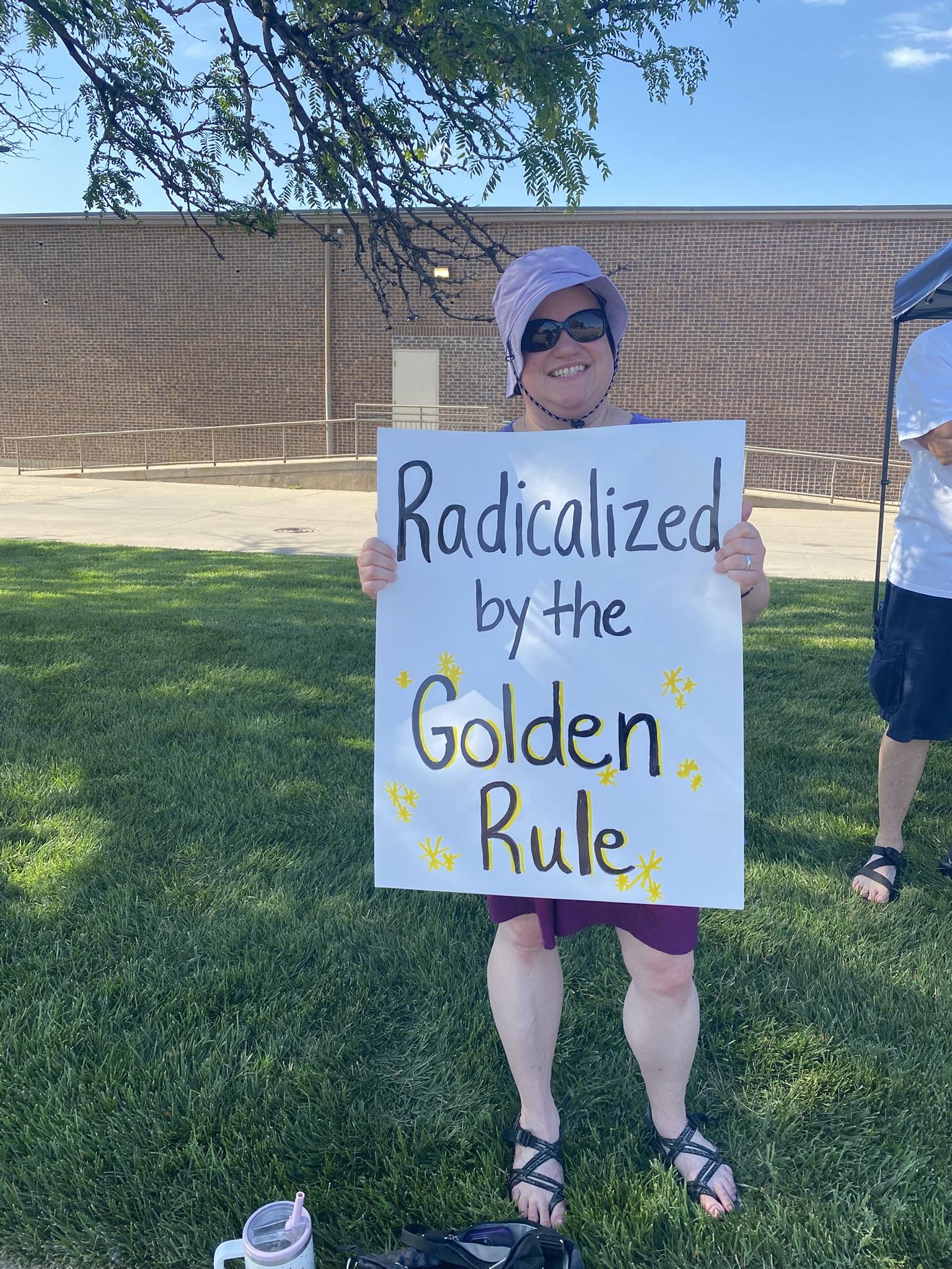 The sign includes several gold sparkles. 